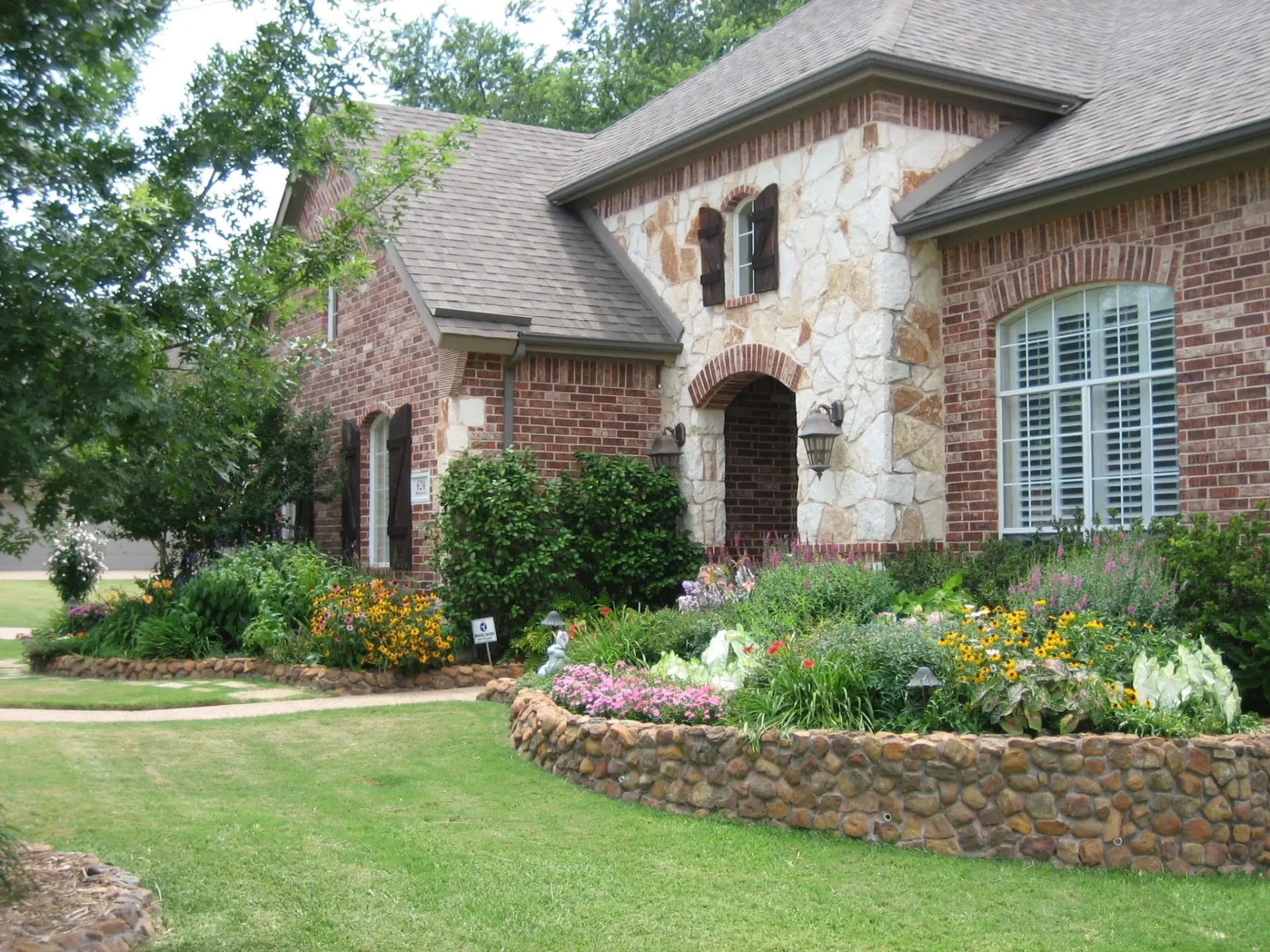 Cobblestone Wall & Front Yard Landscape