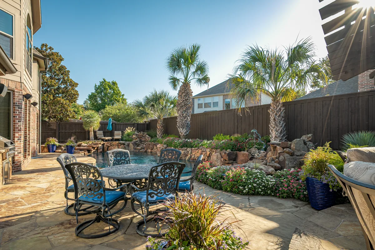 Maintained pool and landscape by Stewart Lawncare